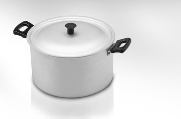 a kitchen pan on a light background, one