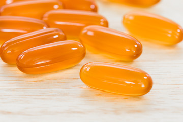 Close up Gel capsule on wooden table