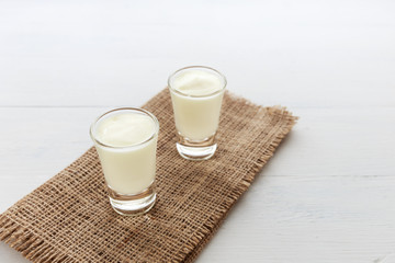 Pure white yogurt on white background