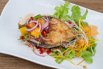 Fillet topped with a spicy dressing.