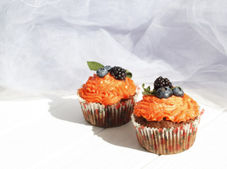 Picture of creamy cake with blueberries and mint