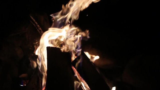 Night campfire with available space at side, close-up