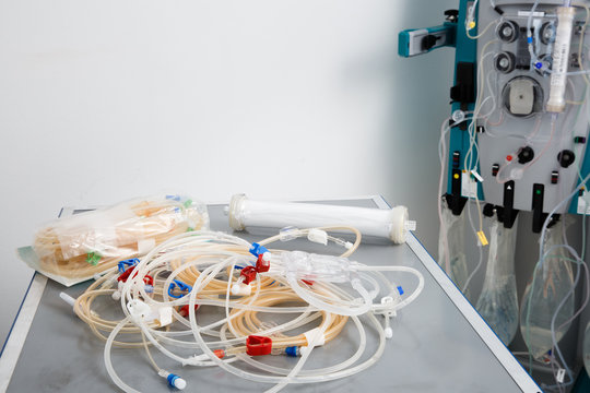 Blood tubes with hemodialysis machine in the background