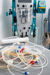 Blood tubes with hemodialysis machine in the background