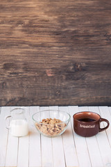 Wholegrain Cereals and flakes with milk and a cup of black tea