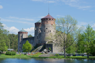 Fototapeta na wymiar Medieval Olavinlinna castle in june on sunny day. Savonlinna, Finland