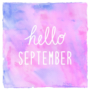 Hello September text on pink blue and violet watercolor backgrou