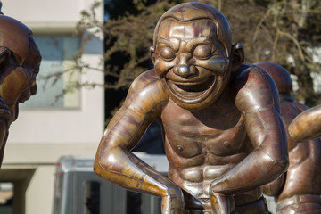 Fototapeta na wymiar Laughing Man Statues In Vancouver