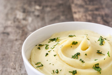 Mashed potato on wooden background

