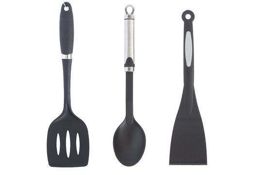 Black plastic kitchen spatula isolated on white