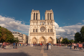 Fototapeta na wymiar Notre Dame de Paris. France. Ancient catholic cathedral on the quay of a river Seine. Famous touristic architecture landmark in summer 