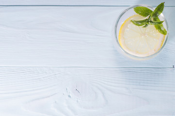  Homemade lemonade with lemon slice and mint leaf