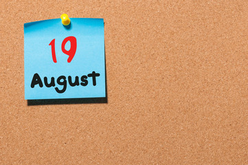 August 19th. Day 19 of month, color sticker calendar on notice board. Summer time. Empty space for text