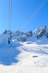 Fototapeta na wymiar Ski lift Saulire. Ski Resort Courchevel wintertime. France