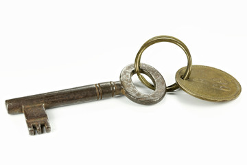 vintage hotel key isolated on white background