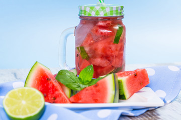 Watermelon and lime lemonades on kitchen table