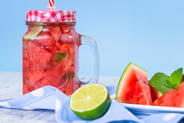 Watermelon and lime lemonades on kitchen table