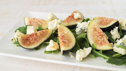Fig arugula blue cheese salad