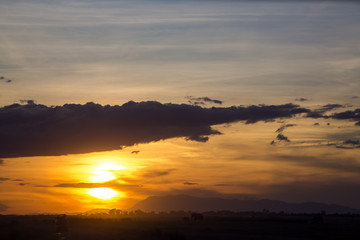 Visitors on jeep shoot wild elephants at sunset in Tarangire National Park, Tanzania.
