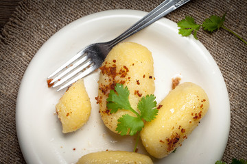 Potato dumplings stuffed with minced meat.
