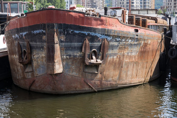 old rusty boats moored on the river
