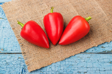 Harvest: red pepper on old vintage table