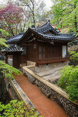 Small bridge to Gilsangheon - a wooden building, living quarters for master sunim (senior monks) at the Gilsangsa Temple in Seoul, South Korea.