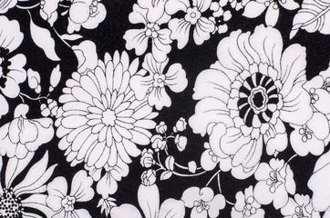 Fotobehang Graphic floral pattern on fabric. Black and white flowers print as background. © luanateutzi