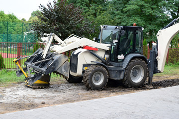 Construction machine. Bulldozer with excavator.