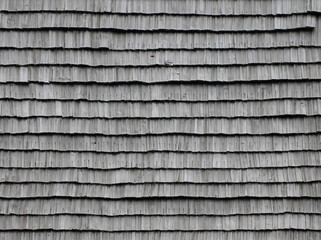 Old wooden roof tiles. Roof texture
