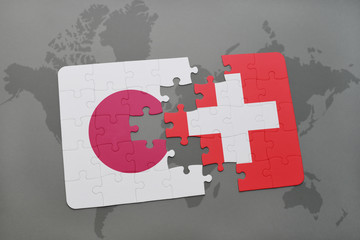 puzzle with the national flag of japan and switzerland on a world map background.