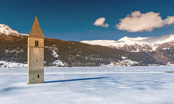 Winter scene at Lake Reschen with sunken steeple.