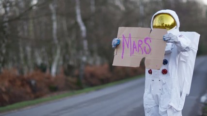  Astronaut returned to earth trying to hitch a ride from passing traffic