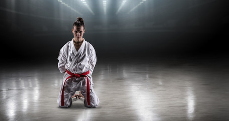 Sexy girl in a kimono karate rejoices victory © bondarchik