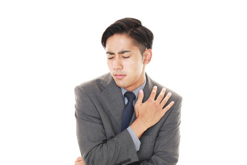 疲れた表情のビジネスマン