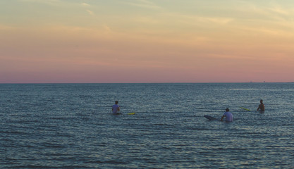 Fototapeta premium Surfers Waiting for Waves