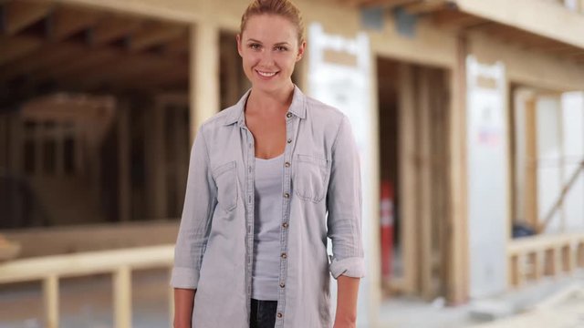 Happy woman construction worker