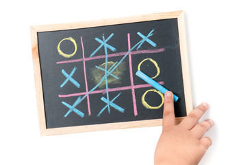 boy  hand drawing a game of tic tac toe