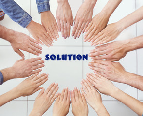 Business training concept. United hands, top view