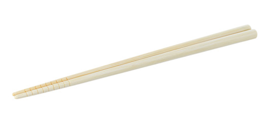 Wooden pairs of chopsticks on white background