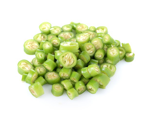 Green chili peppers on white background