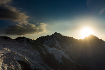 sunset in the mountains. Clouds and sky