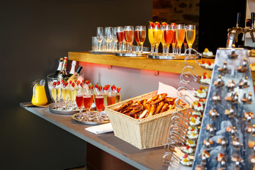 Table in the yard full of different finger food ready for the pa