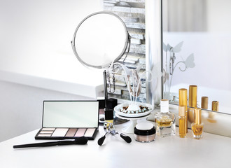 Cosmetic set on light dressing table