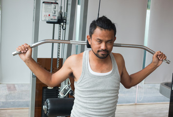 Fototapeta premium exercises in fitness sport club 