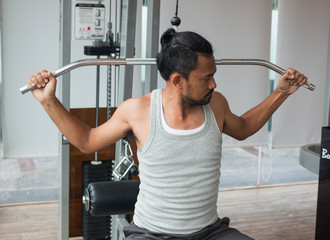 Naklejka premium exercises in fitness sport club 