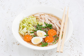 bowl of Chinese soup with glass noodles, closeup