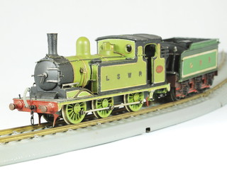 Fototapeta na wymiar Steam locomotive antique toy model
