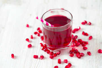 pomegranate juice on table