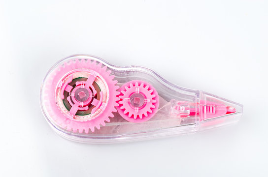 A pink eraser tape tool on white background